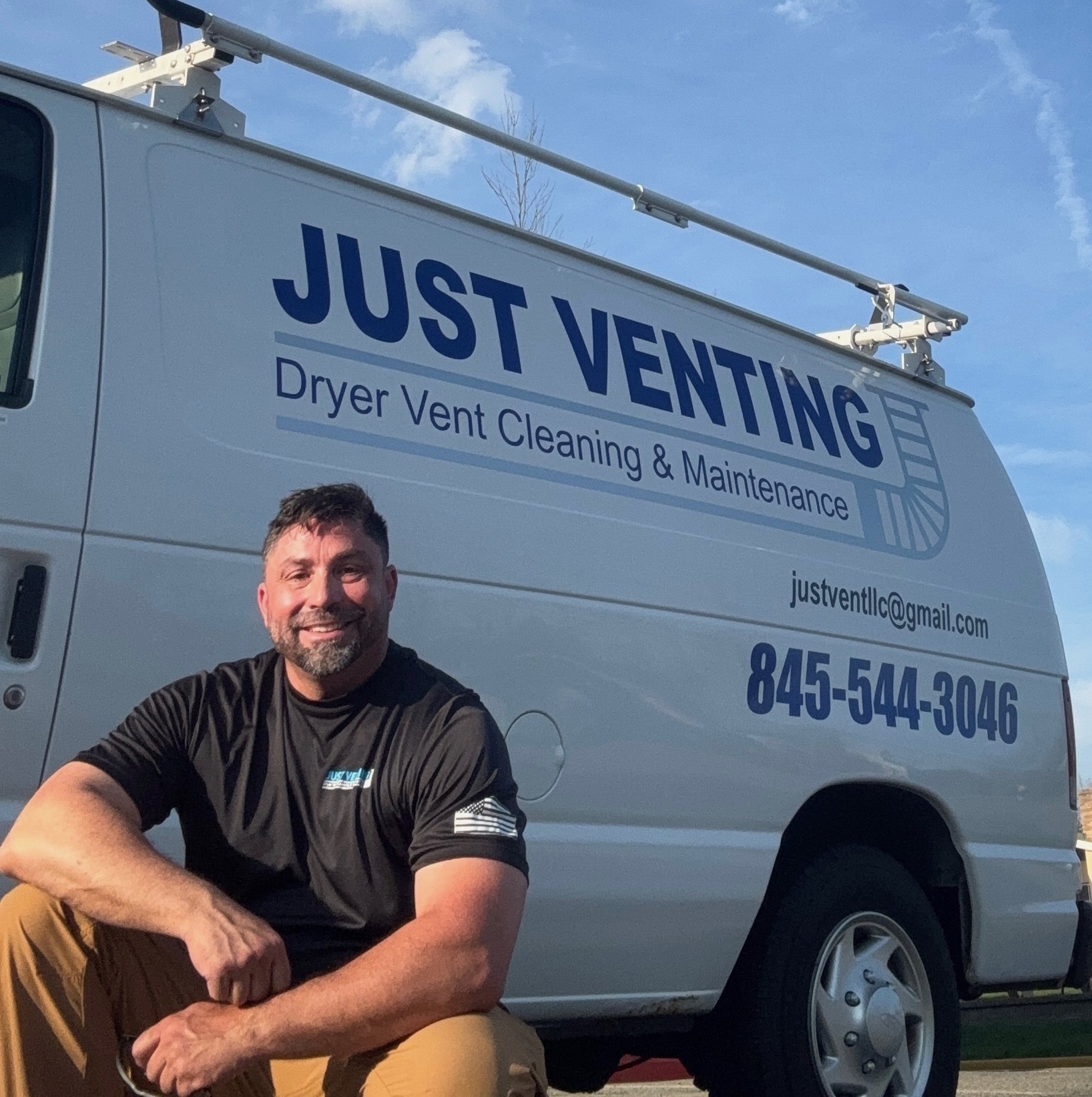 Keith Stewart, owner of Just Venting LLC, in front of his service van